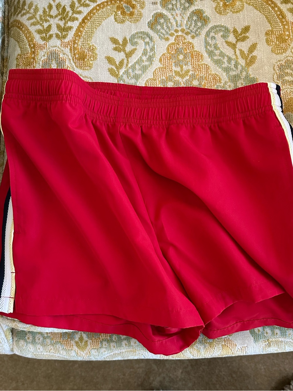Aritzia red track Shorts with yellow, white and navy Side Stripe